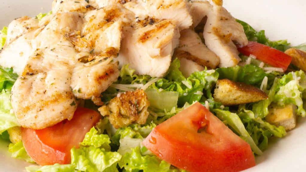 Chicken Caesar Salad · Grilled chicken, romaine lettuce, tomato, parmesan cheese, croutons, Caesar dressing.