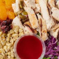 Tropical Salad 12 Oz. · Chicken Breast, Spring Mix, Shredded Red Cabbage, Roasted Corn, Mandarin Orange Wedges, drie...