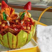 Sandia Loca · Crazy watermelon with oranges, crazy cucumber, strawberries topped with Chamoy Valentina and...