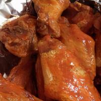 Buffalo Wings (12 Pieces) · Plain, spicy, or BBQ sauce, served with celery and ranch dressing.