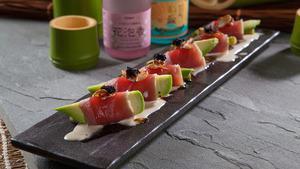 Blackjack · Avocado, asparagus wrapped in seared tuna with tobiko fried garlic, and special dressing.