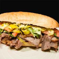 Classic Brisket · Marinated overnight, seasoned and hickory smoked Angus beef on French roll / deli pickles / ...