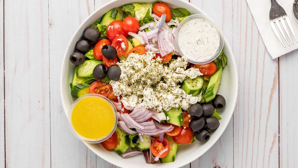 Tehran Salad · Romaine lettuce, feta cheese, grape tomato, Persian cucumber, red onion, and black olive with a special lemon dressing.