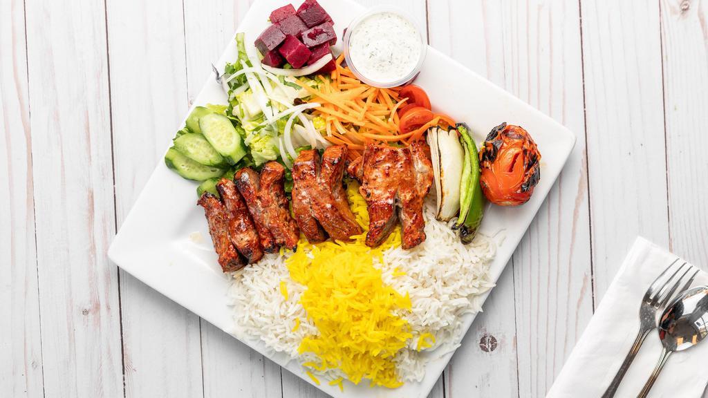 Filet Mignon Shish Kabob · Succulent pieces of filet mignon marinated and grilled with bell pepper and onion