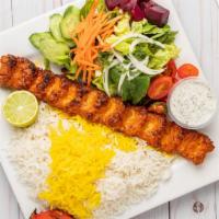 Chicken Koobideh · One skewer of seasoned ground chicken mixed with a grated onion and grilled on an open flame