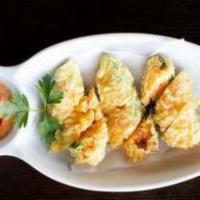 Stuffed Jalapeños · Spicy. Jalapeños stuffed with spicy crab, cream cheese, fried and served with spicy mayo.
