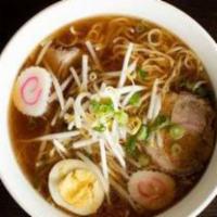 Shoyu Ramen · Pork meat, fish cake, boiled egg, green onion and bean sprouts.