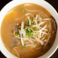 Miso Ramen · Pork meat, fish cake, boiled egg, green onion and bean sprouts.