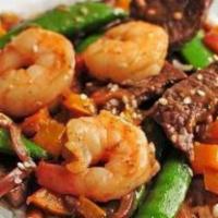 Beef Teriyaki And Shrimp · Teriyaki beef and shrimp sautéed in house sauce, served with vegetables. Served with soup, s...