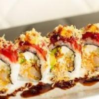 Habibi Roll · Spicy. Inside: shrimp tempura, spicy crab, cream cheese, avocado, cucumber. On top: tuna, av...