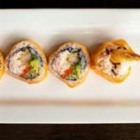 Shrimp Tempura Roll · 2 pieces shrimp, crab meat, avocado, cucumber, wrapped with soy bean paper and seaweed.