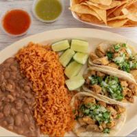 Taco Plate · Three tacos with your choice of one protein (steak, chicken, carnitas, al pastor or grilled ...