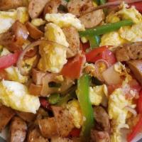 Baja Chicken Scramble · FOUR EGG SCRAMBLE WITH CHICKEN SAUSAGE, TOMATOES, RED & GREEN BELL PEPPERS AND ONIONS. SERVE...