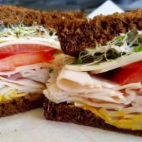 California Turkey · LEAN TURKEY BREAST, ALFALFA SPROUTS, AVOCADO, RED ONIONS, TOMATOES, PROVOLONE CHEESE, MAYONN...