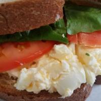 Egg Salad Sandwich · HOMEMADE EGG SALAD TOPPED WITH LETTUCE & TOMATOES. SERVED WITH YOUR CHOICE OF WHITE, WHEAT, ...