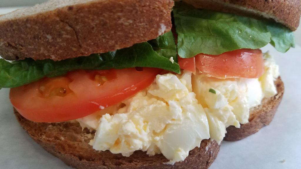 Egg Salad Sandwich · HOMEMADE EGG SALAD TOPPED WITH LETTUCE & TOMATOES. SERVED WITH YOUR CHOICE OF WHITE, WHEAT, MULTI-GRAIN OR SOUR DOUGH BREAD