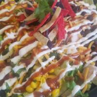Bbq Chicken Ranch Salad · BLACK BEANS, CORN, CILANTRO, TOMATOES, CHEDDAR CHEESE& CHICKEN BREAST WITH DRIZZLED BBQ SAUC...