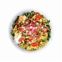 Chicken & Rightrice® · A bowl built on a base of lower-carb, protein-packed RightRice with Arugula, Chicken, Tzatzi...