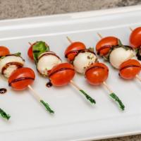 Caprese  Skewers   · Mozzarella with fresh basil, grape tomatoes, drizzle of   oil & balsamic glaze 14 comes with...