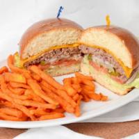 Classic Cheeseburger · Angus beef patty, cheddar, lettuce, tomato, onion, pickle, brioche.