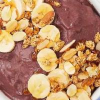 Playful Peanut Butter Acai Bowl · Delicious acai blend with granola, bananas, blueberries, peanut butter, and honey.
