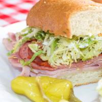 # 2 Ham, Salami & Cheese · Garnished with tomatoes, lettuce, Italian dressing & mayonnaise.  (Red or white Onions added...
