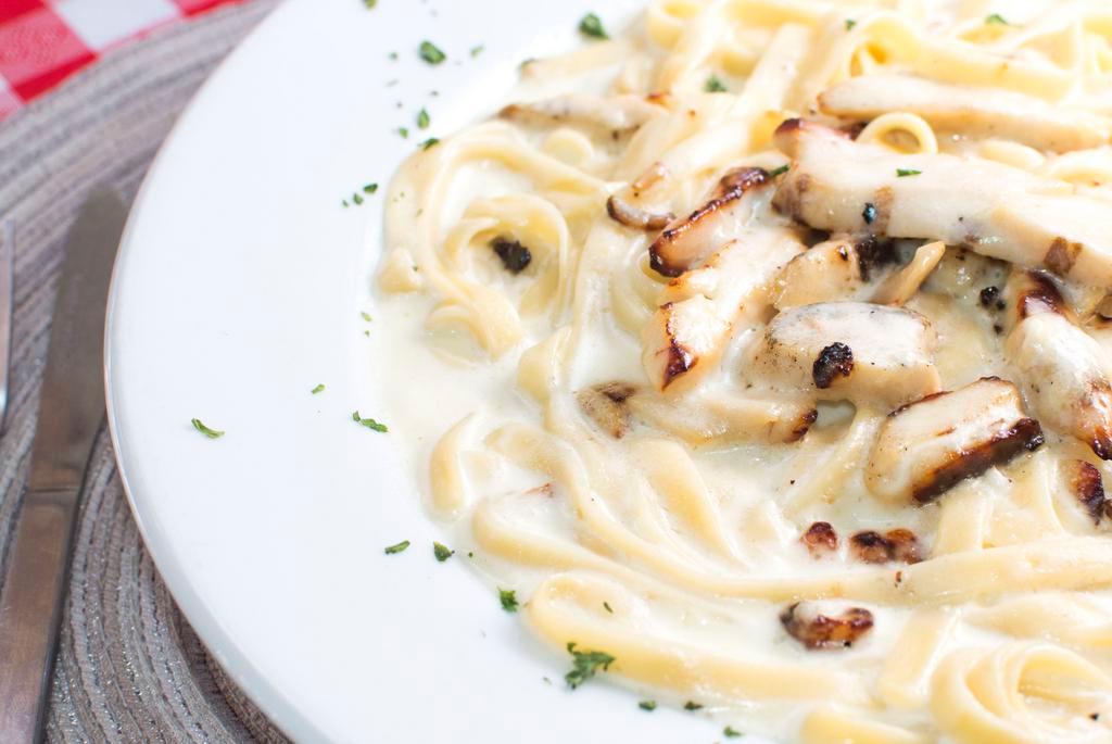 Alfredo · Alfredo (white sauce with cream, garlic, olive oil,& parmigiano cheese.) 
** Add grilled chicken for an additional charge