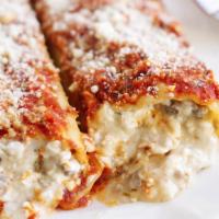 Manicotti  ( Cheese) · Crepes filled with Ricotta cheese topped with Marinara Sauce and Mozzarella cheese