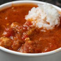 Jambalaya  · A hearty chicken and andouille sausage stew served with scoop of rice.  16OZ