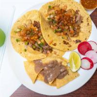 2 Tacos And 1 Medium Agua Fresca · Handpressed tortilla.