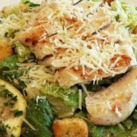 Chicken Caesar Salad · Fresh romaine, tender grilled chicken, shredded Parmesan cheese, croutons, and caesar dressi...