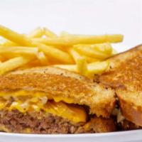 Rubymelt · Served on crunchy, grilled rye bread with double slices of melted American cheese and grille...