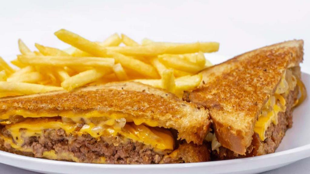 Rubymelt · Served on crunchy, grilled rye bread with double slices of melted American cheese and grilled onions.
