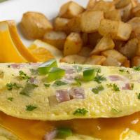 Denver Omelette · Sautéed bell peppers, diced onions and ham with melted cheddar cheese. Served with breakfast...