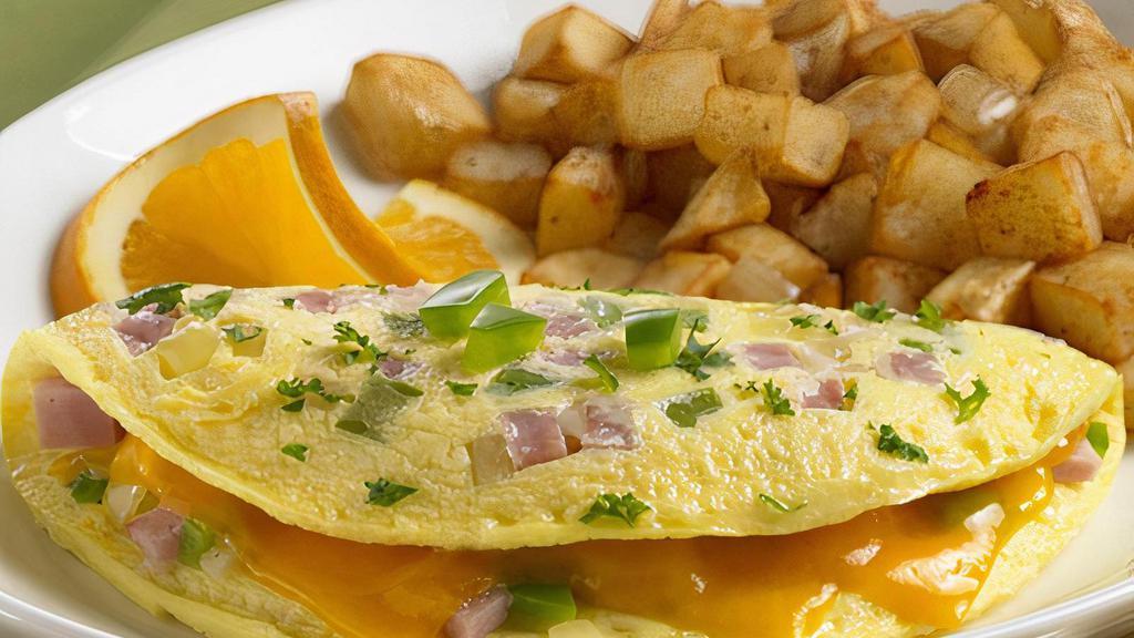 Denver Omelette · Sautéed bell peppers, diced onions and ham with melted cheddar cheese. Served with breakfast potato or fruit and choice of breakfast bread.