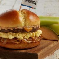 Breakfast  Sandwich · Caramelized onions, creamy scrambled eggs*, cheddar cheese. Served on a potato bun with spic...