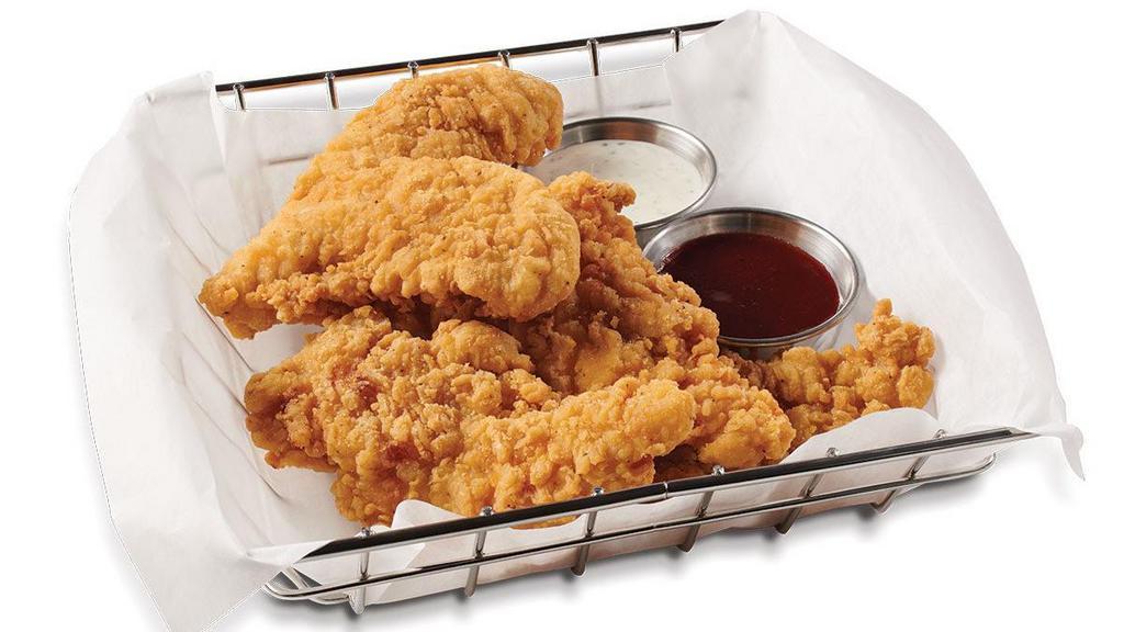Southern-Style Chicken Strips · Crispy, tender chicken served with creamy ranch and tangy BBQ sauces for dipping.