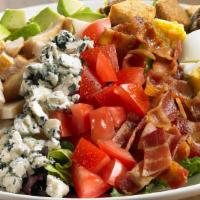 Chicken Cobb Salad · Diced chicken breast, Applewood-smoked bacon, fresh avocado, tomatoes, chopped hard-boiled e...