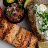 Grilled Atlantic Salmon · Lightly seasoned grilled atlantic salmon served with choice of 2 sides.