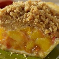 Whole Dutch Apple Pie · Sugar and cinnamon-tossed apple slices are baked to perfection beneath a sweet, golden, crum...