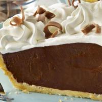 Whole Chocolate Cream Pie · Creamy chocolate perfectly matched with sweet whipped cream and chocolate curls.