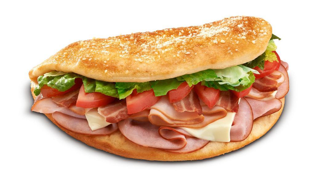 Turkey Club · Turkey breast, ham, bacon, mozzarella, side of mayo. 500 - 840 calories.