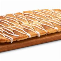 Cinnamon Howie Bread · 70 cal per piece. 16 Piece. Hot, buttered breadsticks sprinkled with cinnamon & sugar, serve...