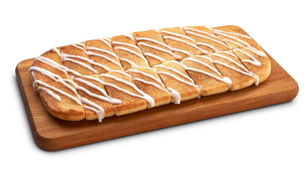 Cinnamon Howie Bread · Hot, buttered bread sticks sprinkled with cinnamon & sugar, served with a side of sweet, white icing. 70 Calories.