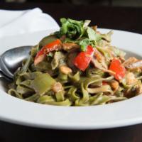 Chicken Tequila Fettuccine · Spinach fettuccine, bell peppers, red onion, jalapeño, tequila-lime cream sauce.