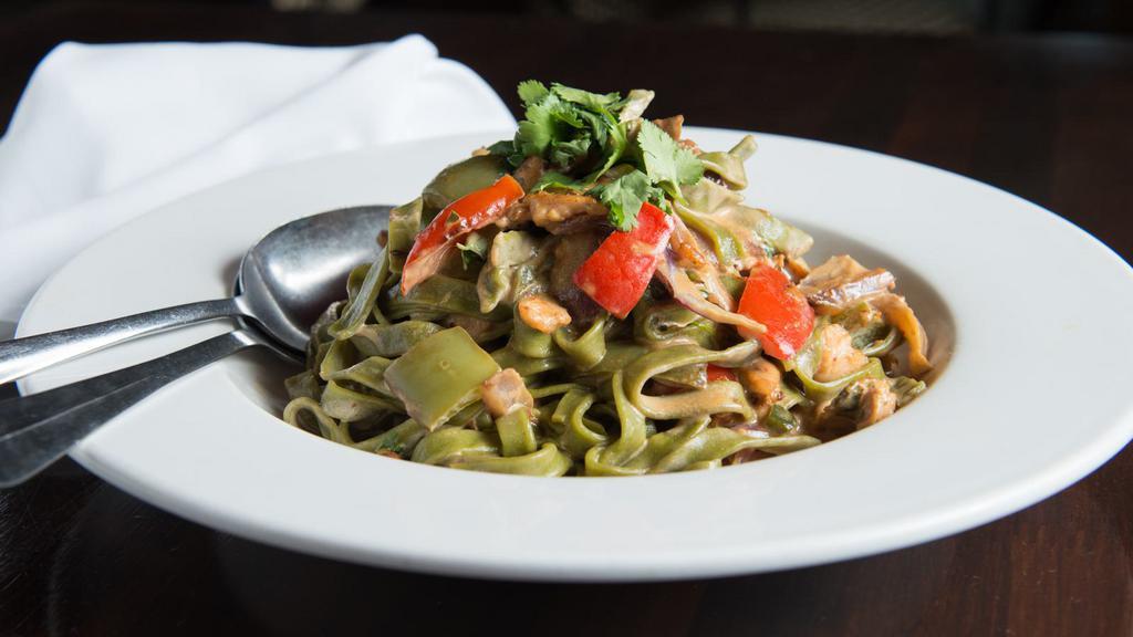 Chicken Tequila Fettuccine · Spinach fettuccine, bell peppers, red onion, jalapeño, cilantro, tequila-lime cream sauce