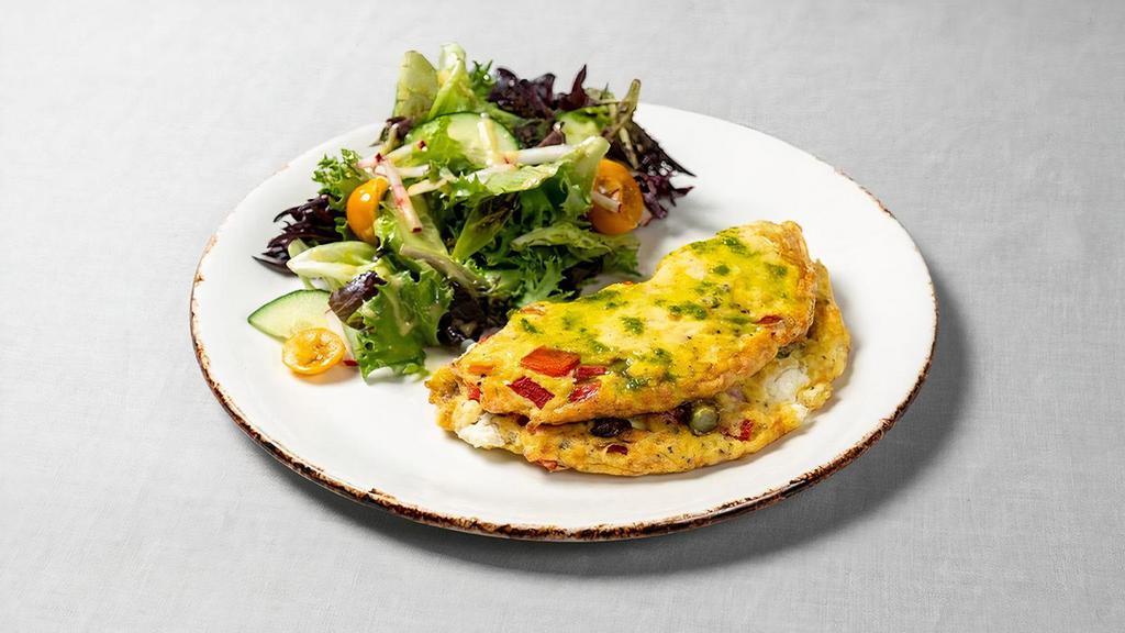 Mushroom & Goat Cheese Omelette · served with small green salad