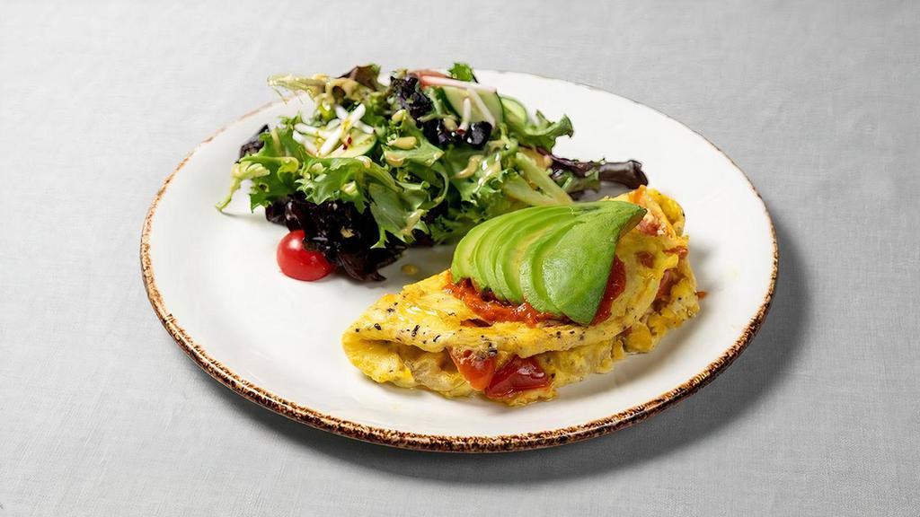 Harissa-Tomato Jam & Avocado Omelette · served with a small side salad