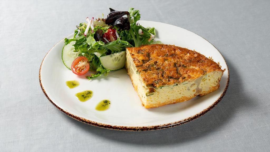 Roasted Cauliflower & Cheddar Frittata · Oven-baked omelette, served with a side of bread and small green salad