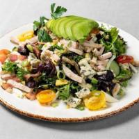 Grilled Chicken Cobb Salad · chicken, avocado, bacon, Fourme d'Ambert, cucumber, hard boiled egg, greens, and a smoked te...